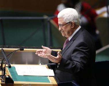 Palestinian President Mahmoud Abbas reacts as he arrives to address the United Nations Generally Assembly at UN Headquarters, in New York,