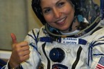The world's first woman space tourist Anousheh Ansari smiles at the Baikonur cosmodrome in Kazakhstan, early 18 September 2006. The Russian-made Soyuz rocket left the Russian base in Kazakhstan at 0408 GMT, carrying a Soyuz TMA-9 capsule and its three passengers: Iranian-born US citizen and millionaire tourist Ansari, NASA's Michael Lopez-Alegria and Russian cosmonaut Mikhail Tyurin.  AFP PHOTO / MAXIM MARMUR