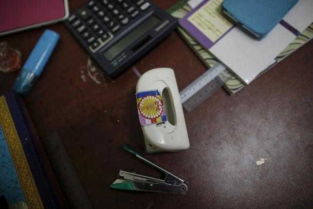 The logo of the 969 movement is seen on a paper puncher at the head office of Buddhist group Ma Ba Tha in Yangon August 26, 2015. REUTERS/Soe Zeya Tun