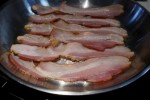 Bacon is fried up in a pan in a kitchen in this photo illustration in Golden, Colorado, October 26, 2015. REUTERS/Rick Wilking