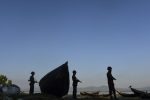 Border Guard Bangladesh (BGB) personel stand watch in a common transit point for the illegal entry of Myanmar Rohingya refugees on the banks of the Naf River, near Teknaf in southern Cox's Bazar district, on November 24, 2016.
Dhaka has called on Myanmar to take "urgent measures" to protect its Rohingya minority after thousands crossed into Bangladesh in just a few days, some saying the military was burning villages and raping young girls. / AFP PHOTO / MUNIR UZ ZAMAN
