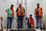 Hindu Yuva Vahini members pose inside the vigilante group's office in the city of Unnao, India, April 5, 2017. Picture taken April 5, 2017. REUTERS/Cathal McNaughton    To Match Insight INDIA-POLITICS/RELIGION - RTS12P2Z