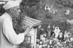 Jawaharlal Nehru (1889 - 1964) addresses a crowd from the balcony of his house in Simla, India.   (Photo by Fox Photos/Getty Images)