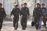 (FILES) This file photo taken on February 3, 2018 shows Myanmar military commander-in-chief Senior General Min Aung Hlaing (C) arriving with senior military officials for the second day of the joint military exercises in the Ayeyarwaddy delta region.
Myanmar rejected the findings of a UN probe alleging genocide by its military against the Rohingya, a government spokesman said on August 29, 2018 in the country's first response to a damning report on the crisis. / AFP PHOTO / POOL / LYNN BO BO