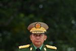 TOPSHOT - Myanmar's Chief Senior General Min Aung Hlaing, commander-in-chief of the Myanmar armed forces, arrives to pay his respects to Myanmar independence hero General Aung San and eight others assassinated in 1947, during a ceremony to mark the 71th anniversary of Martyrs' Day in Yangon on July 19, 2018. - Myanmar observes the 71th anniversary of Martyrs' Day, marking the assassination of independence heroes including Aung San Suu Kyi's father, who helped end British colonial rule. (Photo by YE AUNG THU / AFP)        (Photo credit should read YE AUNG THU/AFP via Getty Images)