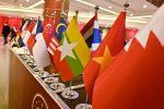 (FILES) In this file photo taken on November 4, 2019, the Myanmar national flag (C) is seen with flags of member countries attending the 35th Association of Southeast Asian Nations (ASEAN) Summit in Bangkok. - Myanmar's junta chief will be excluded from an upcoming ASEAN summit, the group said on October 16, 2021, a rare rebuke as concerns rise over the military government's commitment to defusing a bloody crisis. (Photo by Romeo GACAD / AFP)