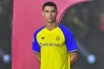 Al-Nassr's new Portuguese forward Cristiano Ronaldo greets the fans during his unveiling at the Mrsool Park Stadium in the Saudi capital Riyadh on January 3, 2023. (Photo by AFP) (Photo by -/AFP via Getty Images)