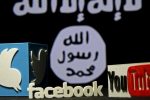 A 3D plastic representation of the Twitter and Youtube logo is seen in front of a displayed ISIS flag in this photo illustration in Zenica, Bosnia and Herzegovina, February 3, 2016. Iraq is trying to persuade satellite firms to halt Internet services in areas under Islamic State's rule, seeking to deal a major blow to the group's potent propaganda machine which relies heavily on social media to inspire its followers to wage jihad. Picture taken February 3, 2016. To match Insight MIDEAST-CRISIS/IRAQ-INTERNET REUTERS/Dado Ruvic      TPX IMAGES OF THE DAY
