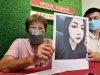 (from left) Joss stick seller Lee Soo Har, 73, holding up a picture of her granddaughter Chow Lai Wah during a press conference held by Ipoh Timur MP's political secretary Steven Tiw in Ipoh on Friday (may13). With them is Pasir Pinji assemblyman's political secretary Aldrin Ng.